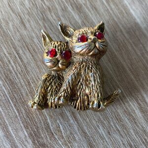 Vintage Rare, Schrager Gold-Tone Cats Brooch with Red Rhinestone Eyes